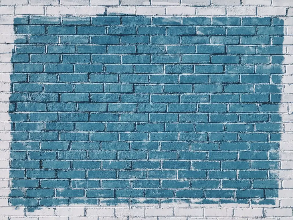 gray concrete bricks painted in blue