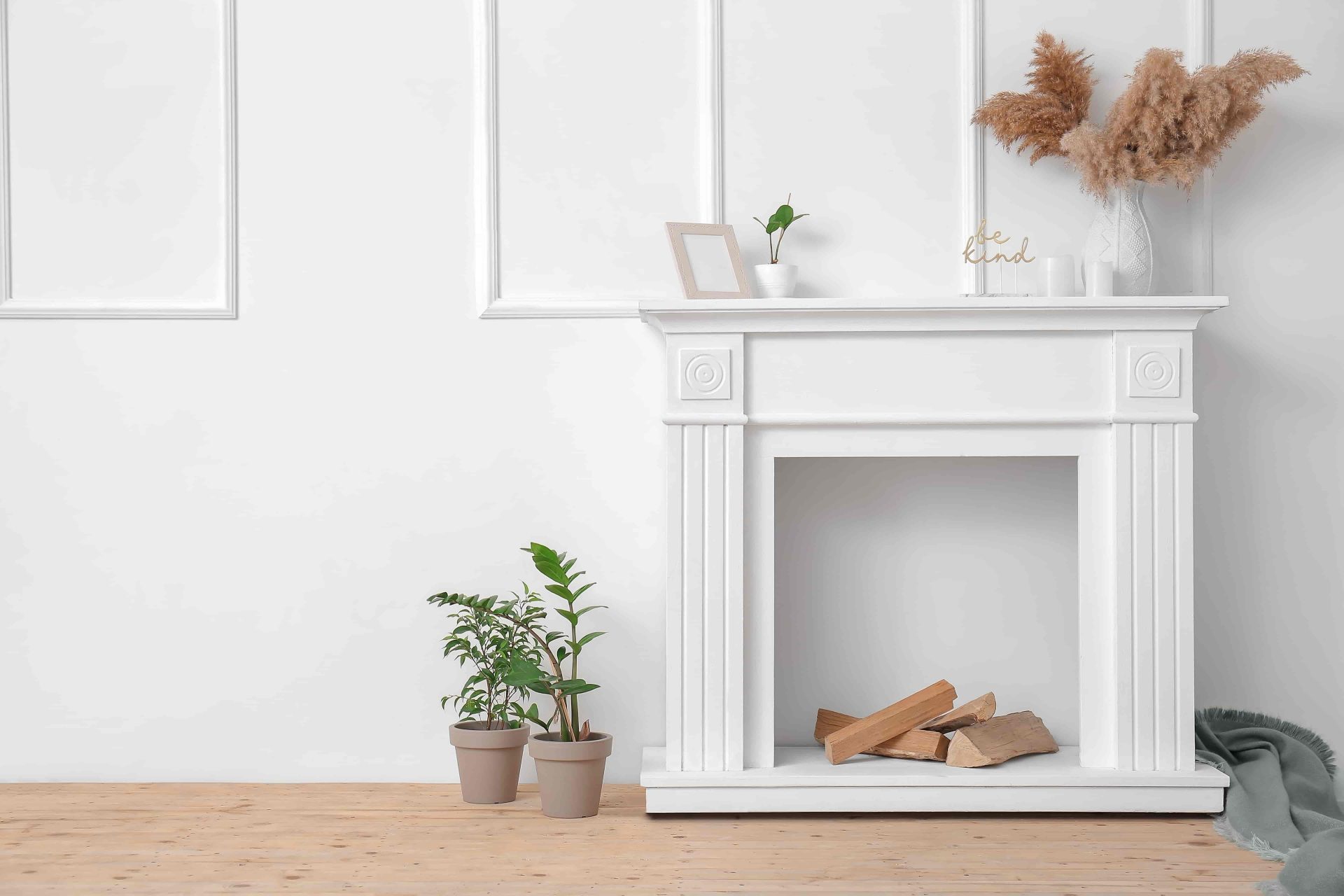 How to Make A DIY Fake Fireplace: Cardboard, Dresser, Planters How to Make a Fake Fireplace