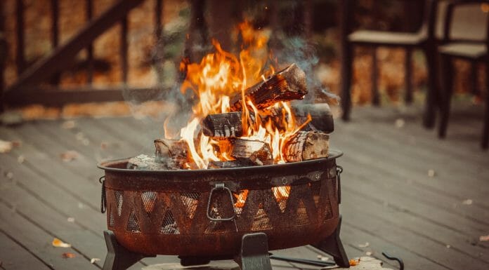 The 7+ Best Fire Pit Chairs For Cozy Seating burning wood on fire pit
