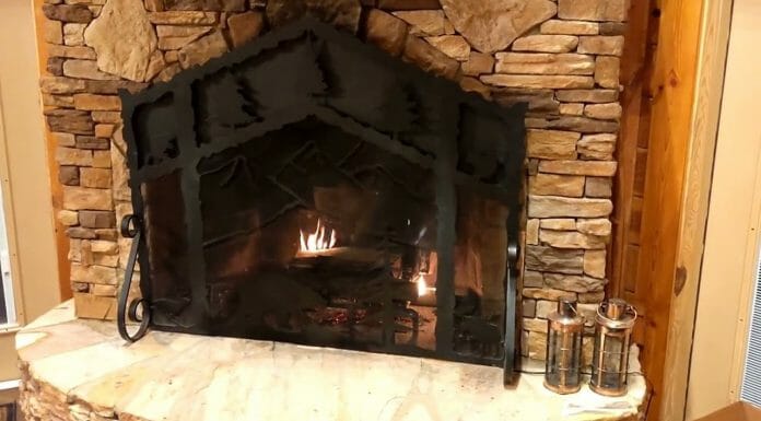 Fireplace Heat Exchangers: Everything You Need To Know A stone fireplace in a living room.