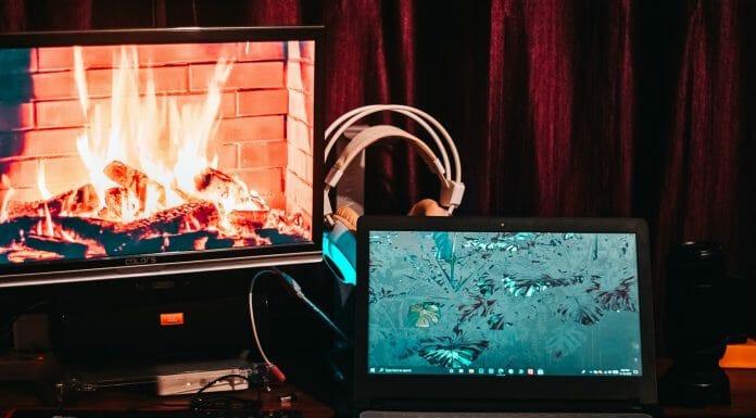 Fireplaces With Speakers: Everything You Need To Know black flat screen computer monitor beside black computer keyboard