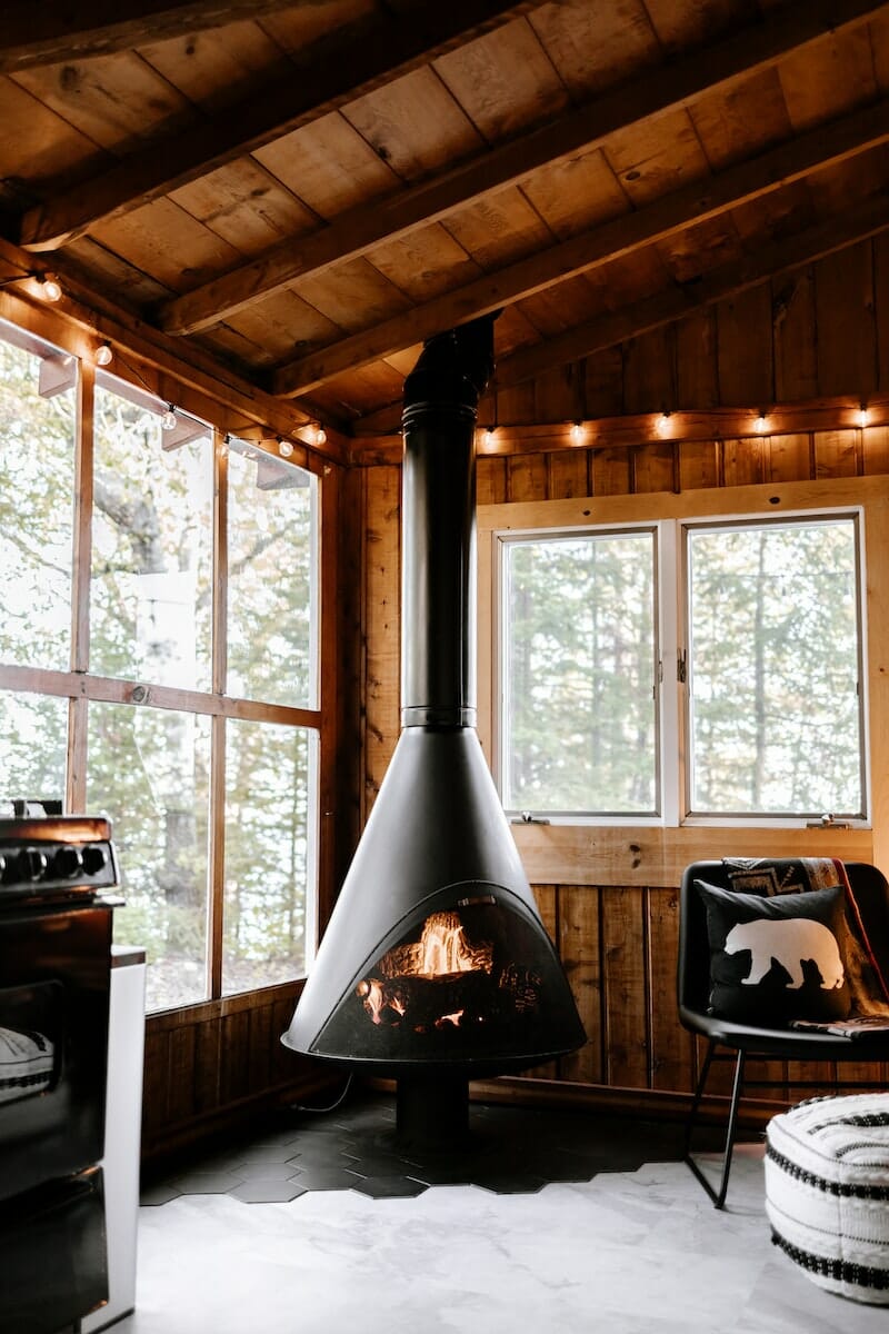 What are the drawbacks of using a wood-burning fireplace?
